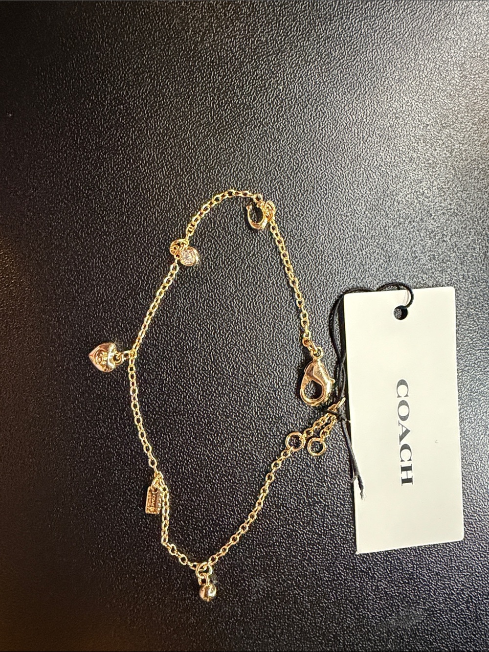COACH Gold-Tone Heart Charm Bracelet